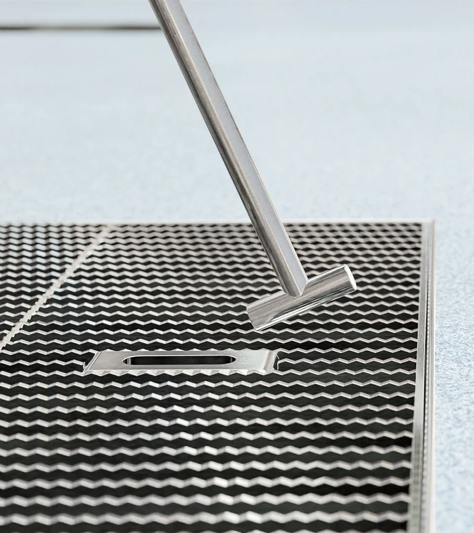 Grate removal tool for floor troughs